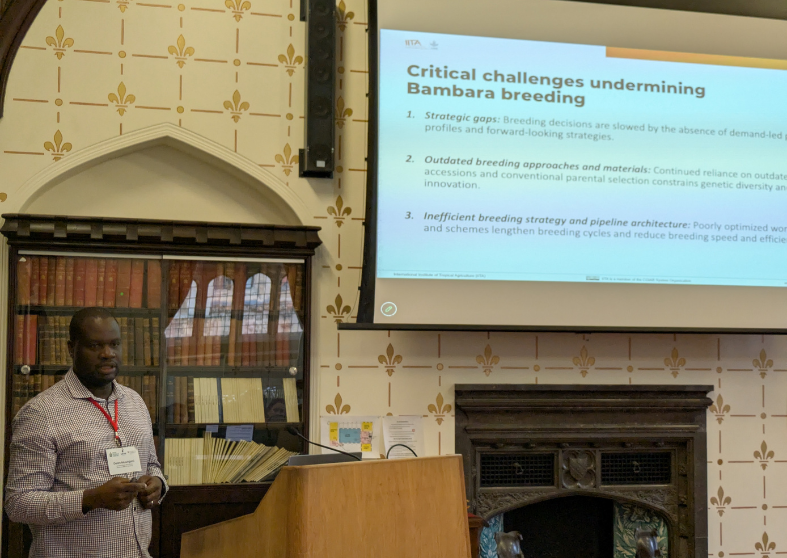 Dean Muungani from IITA, Nigeria presents at the UK-CGIAR Bambara groundnut consortium meeting February 2026. Credit: Aga Alexander / Crop Science Centre, Cambridge.